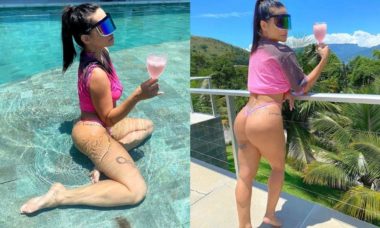De biquíni rosa, Cleo Pires curte o calor carioca com drink e piscina