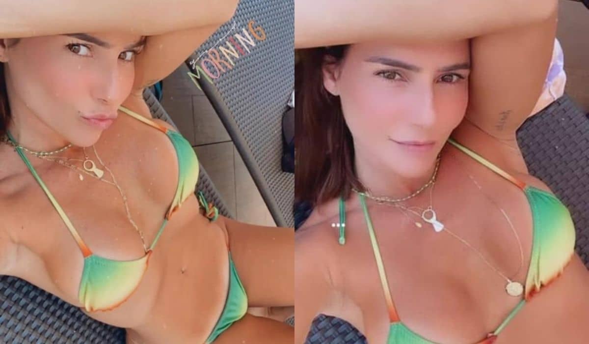 Deborah Secco renova o bronze ao posar de biquíni em piscina de hotel