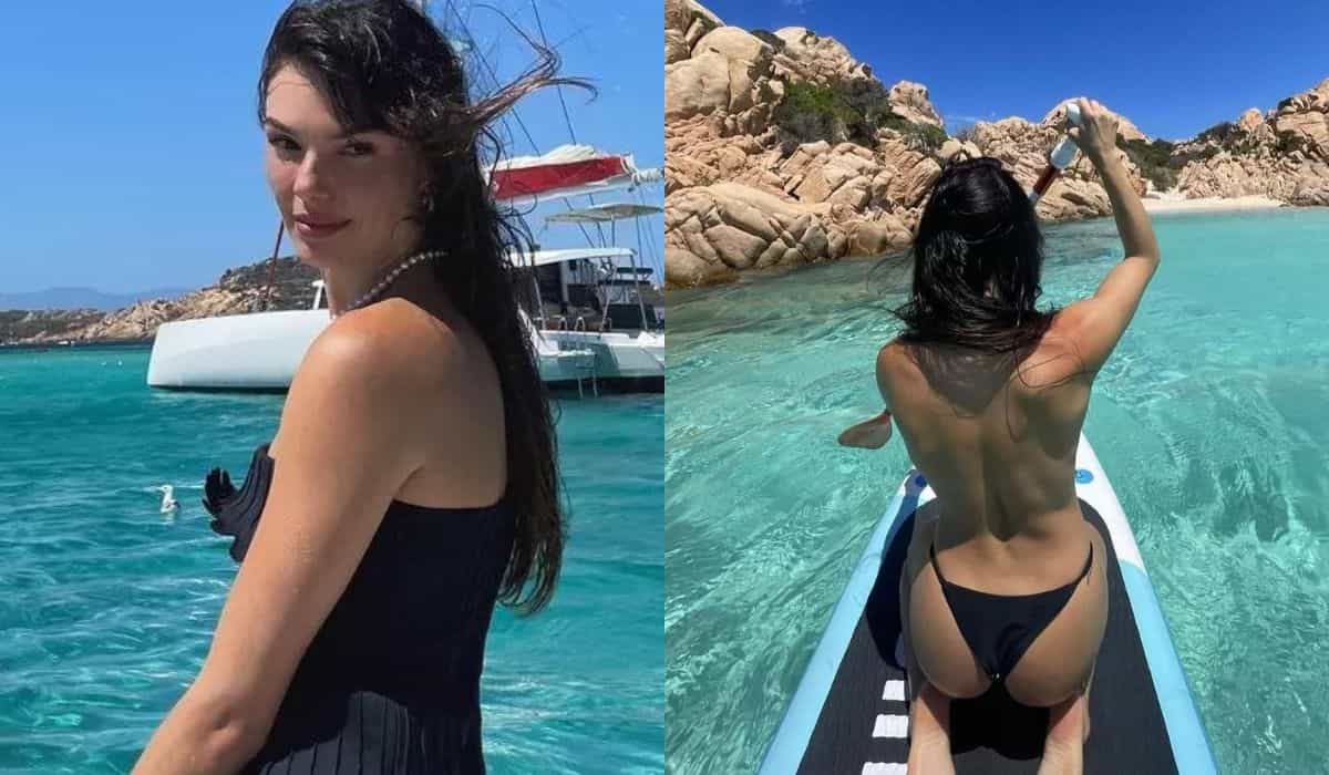 Isis Valverde faz 'stand up paddle' de topless em viagem pela Itália