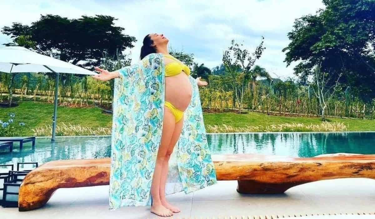 De biquíni, Claudia Raia exibe barrigão da gravidez: 'plena'