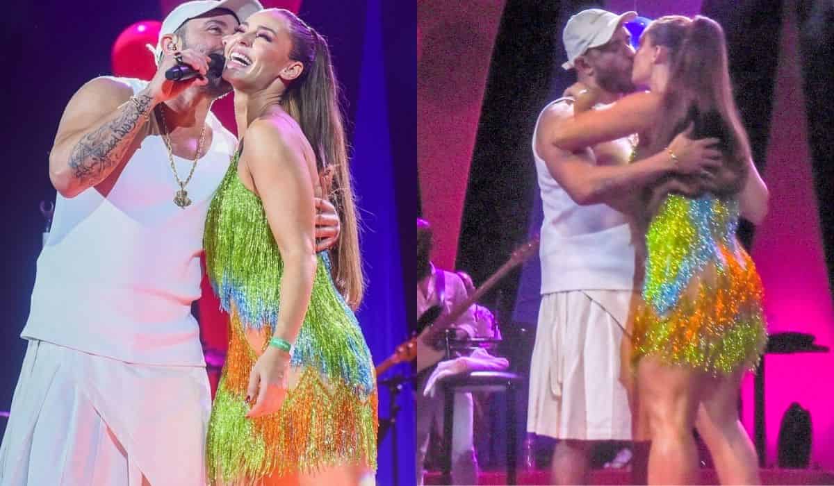 Diogo Nogueira e Paolla Oliveira se beijam no palco durante show