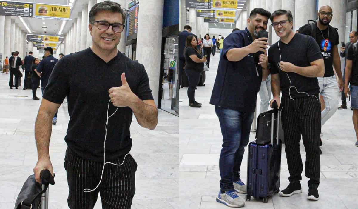 Jarbas Homem de Mello é tietado por fã em aeroporto do RJ