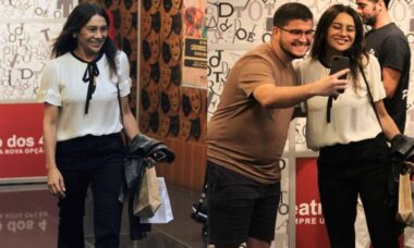 Dira Paes tira foto com fã ao curtir passeio por shopping do RJ