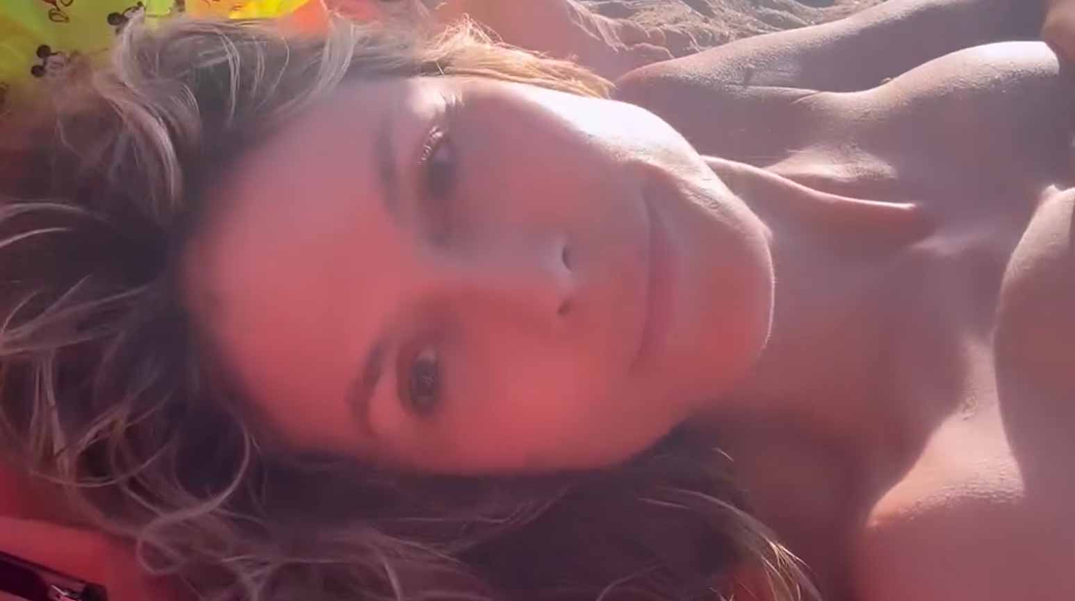 The model shares a video and relaxes on the beach. Photo: Instagram Reproduction @heidiklum