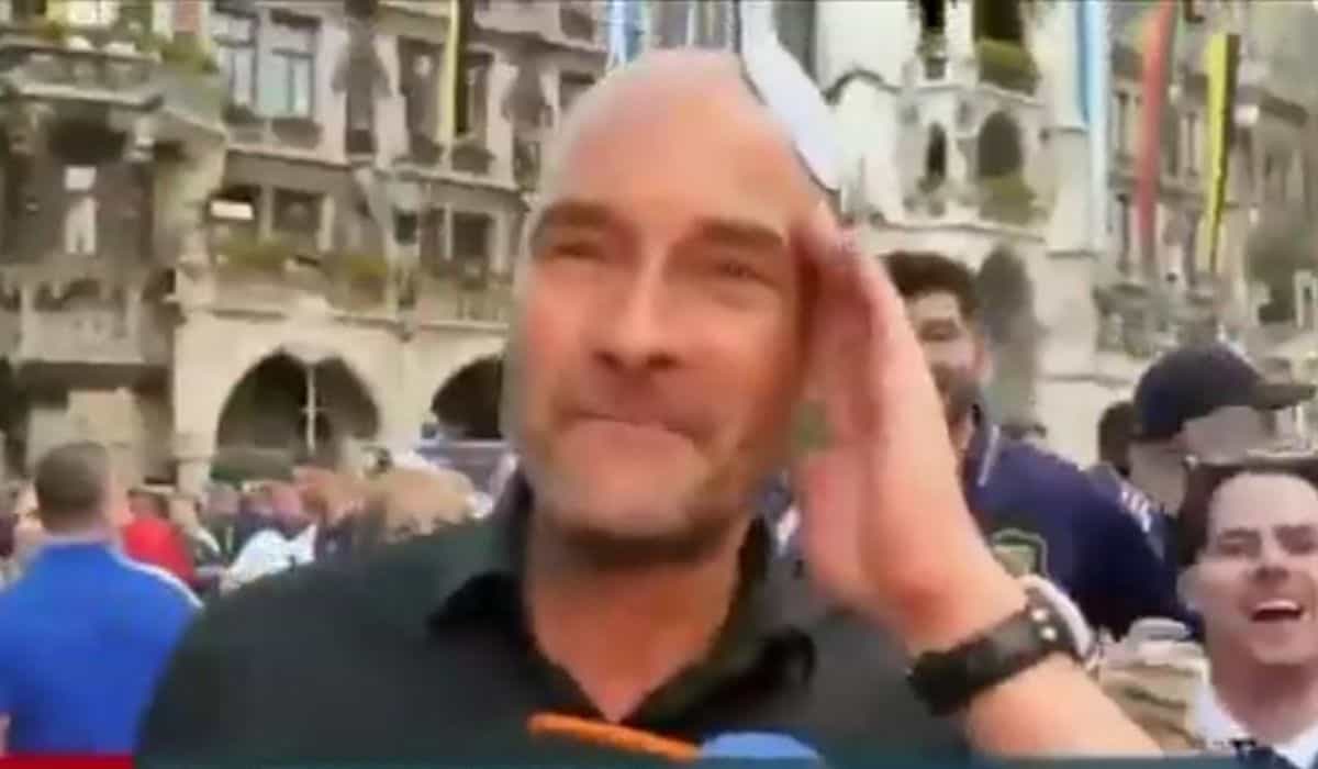 Jornalista alemão enfrenta momento embaraço ao vivo após brincadeira de torcedor escocês na cobertura da Euro 2024