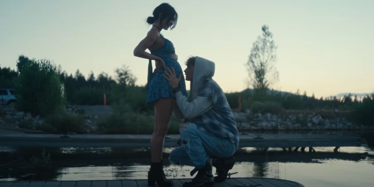 Megan Fox shows off her baby bump in Machine Gun Kelly's music video