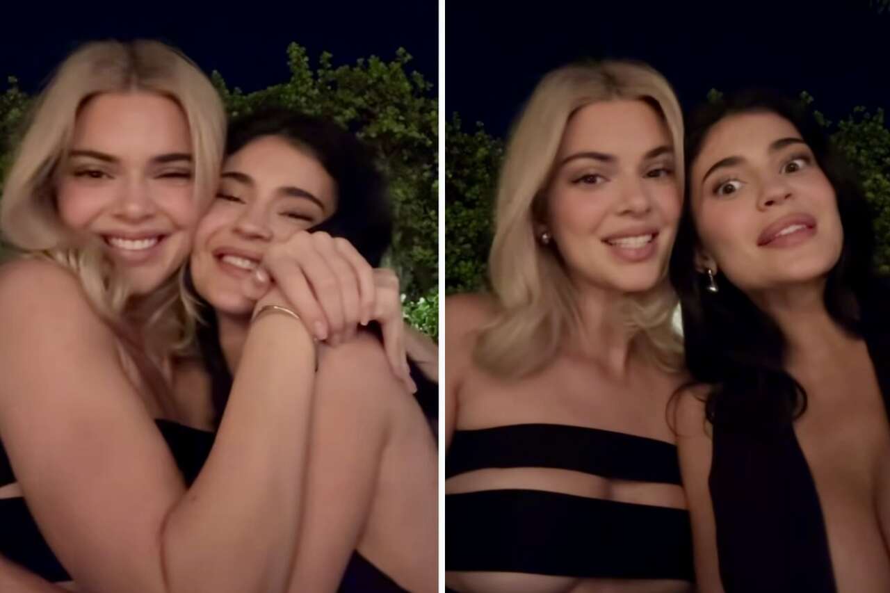 Kendall Jenner appears with a cut-out top and almost shows too much in a video alongside her sister, Kylie